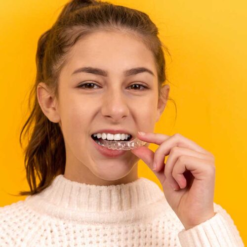 Invisalign costs less and is invisible to others, see why its so popular at Coney Island Dental in NY
